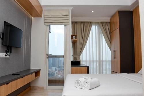 โคซี่ ลิฟวิ่ง สตูดิโอ แอท เมนเตง พาร์ค อพาร์ตเมนต์ บาย ทราเวลิโอ (Cozy Living Studio at Menteng Park Apt By Travelio)1