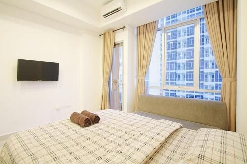 Apartment 2BR @ Capitol Park Residence By Travelio1