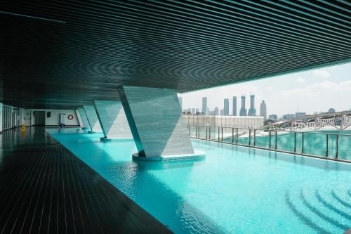 เบสต์ มินิมอลลิสต์ สตูดิโอ เมนเตงพาร์ค บาย ทราเวลิโอ (Best Minimalist Studio Menteng Park By Travelio)0