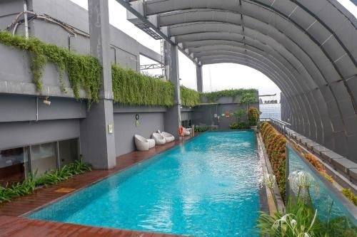 เอลิแกนต์ ไนซ์ 2 ห้องนอน ที่ ลาเวนิล ปันโจกัน บาย ทราเวลิโอ (Elegant Nice 2BR at L'Avenue Pancoran By Travelio)0