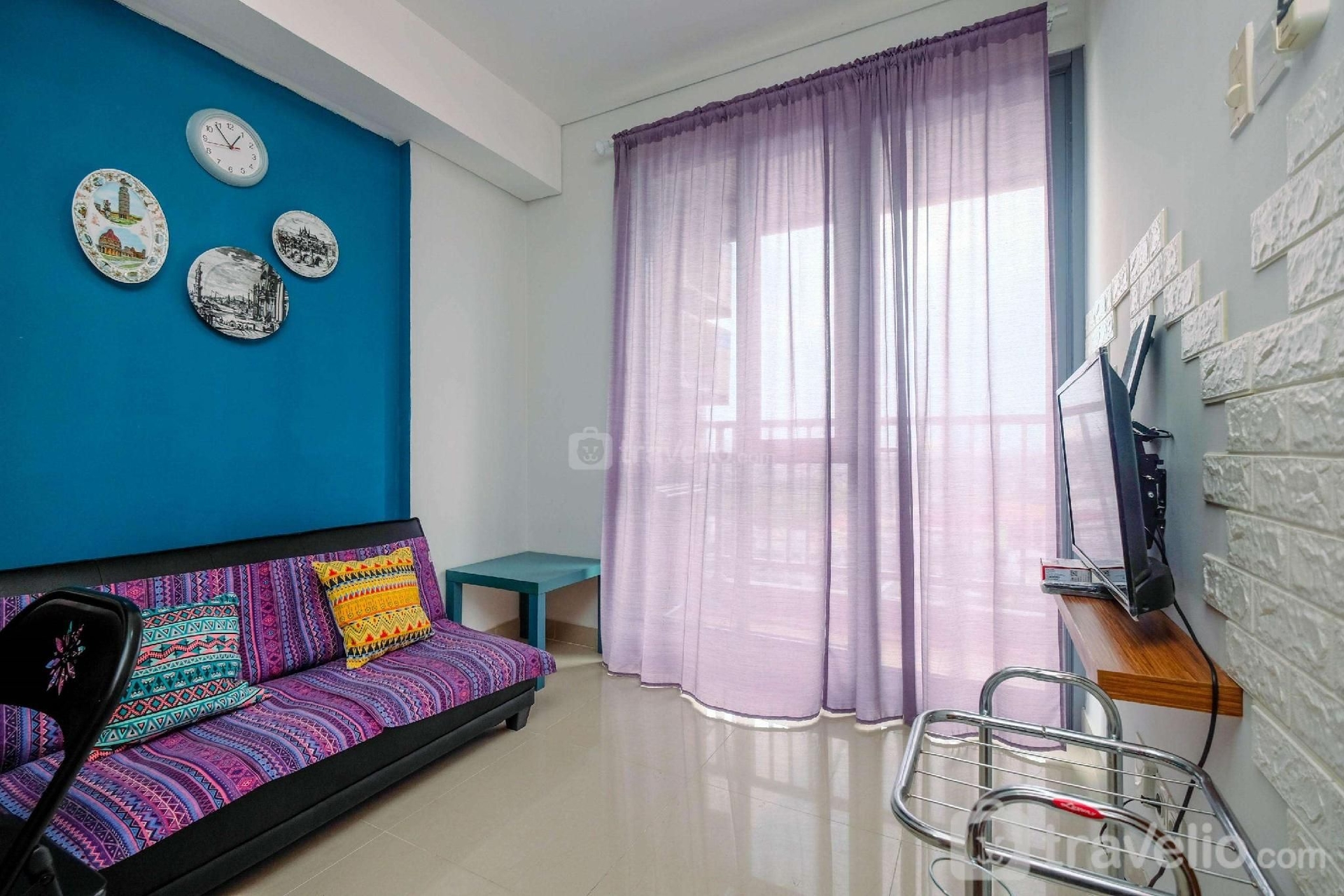 Homey 1BR at Royal Olive Residence By Travelio1