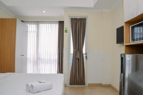 ห้องสตูดิโอสวยหรู ที่ เมนเตง พาร์ค โดย ทราเวลิโอ (Fancy and Nice Studio at Menteng Park By Travelio)3