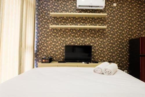 อพาร์ตเมนต์สตูดิโอสุดเรียบง่าย ที่ เอลพิส เรซิเดนซ์ โดย ทราเวลิโอ (Simple Studio Apt at Elpis Residence By Travelio)1