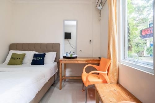 อูร์บานวิว โฮเทล มิโนงก้า ปอนด็อก ลาบู บาย เรดดอร์ซ (Urbanview Hotel Minongga Pondok Labu by RedDoorz)2