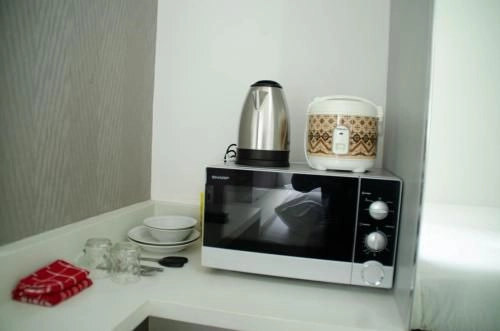 ไนซ์ สตูดิโอ แอท เออโรโพลิส เรซิเดนซ์ บาย เทรเวลิโอ (Nice Studio at Aeropolis Residence By Travelio)2
