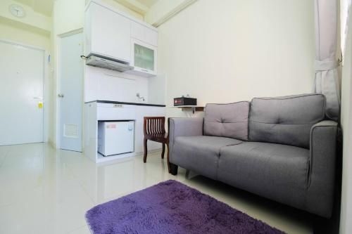 Tranquil 2BR @ Green Pramuka Apartment By Travelio2