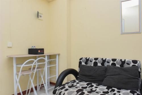 อพาร์ทเมนท์ 2 ห้องนอนแสนสบายที่ เมืองปรามุคา กรีน โดยทราเวลลิโอ (Comfort 2BR at Green Pramuka City Apt By Travelio)1