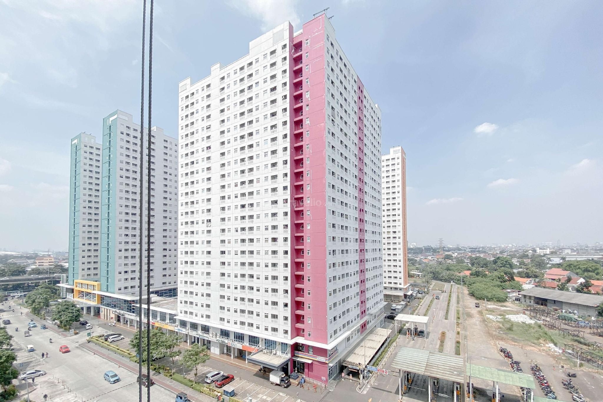 อพาร์ทเมนท์ 2 ห้องนอน เมืองปรามุคา กรีน ที่แสนอบอุ่นจาก ทราเวลลิโอ (Living Cozy 2BR Green Pramuka City Apt By Travelio)2