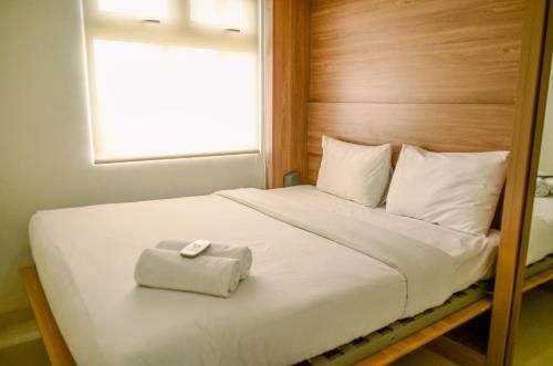 ที่พัก 2 ห้องนอนที่ เมืองปรามุคา กรีนที่สะดวกสบายและเรียบง่าย โดย ทราเวลลิโอ (Comfort Simple 2BR Green Pramuka City By Travelio)2