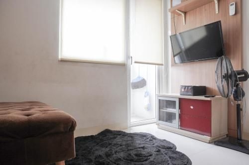 ที่พัก 2 ห้องนอนที่ เมืองปรามุคา กรีนที่สะดวกสบายและเรียบง่าย โดย ทราเวลลิโอ (Comfort Simple 2BR Green Pramuka City By Travelio)1