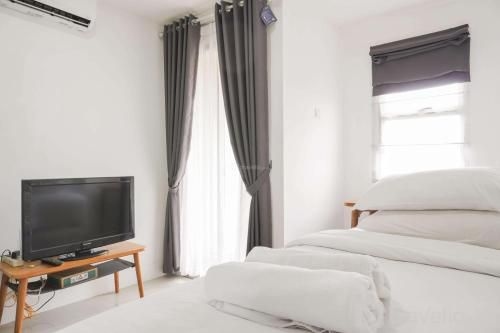 สตูดิโอสุดตระการตา เบลมอนท์ เรสซิเดนซ์ ปูริ โดยทราเวลลิโอ (Stunning Studio Belmont Residence Puri By Travelio)3