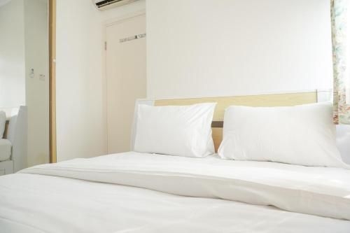 ห้องพัก 2 ห้องนอนทันสมัยที่ เมืองเขียวประมูกา โดย ทราเวลลิโอ (Nice Modern 2BR at Green Pramuka City By Travelio)1