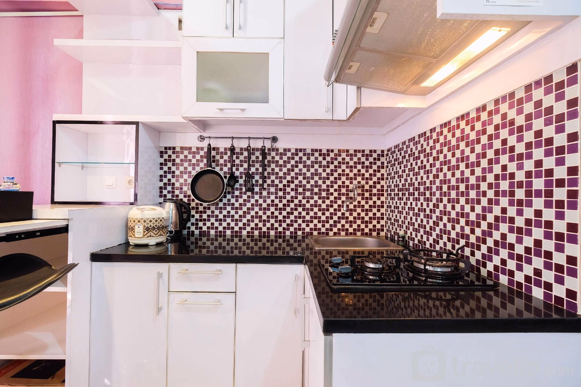 Homey 1BR Green Pramuka Apartment By Travelio1