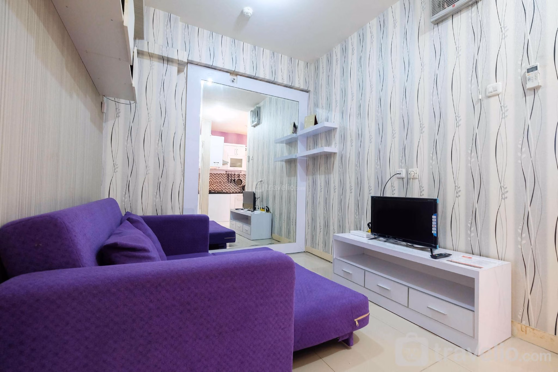 Homey 1BR Green Pramuka Apartment By Travelio3