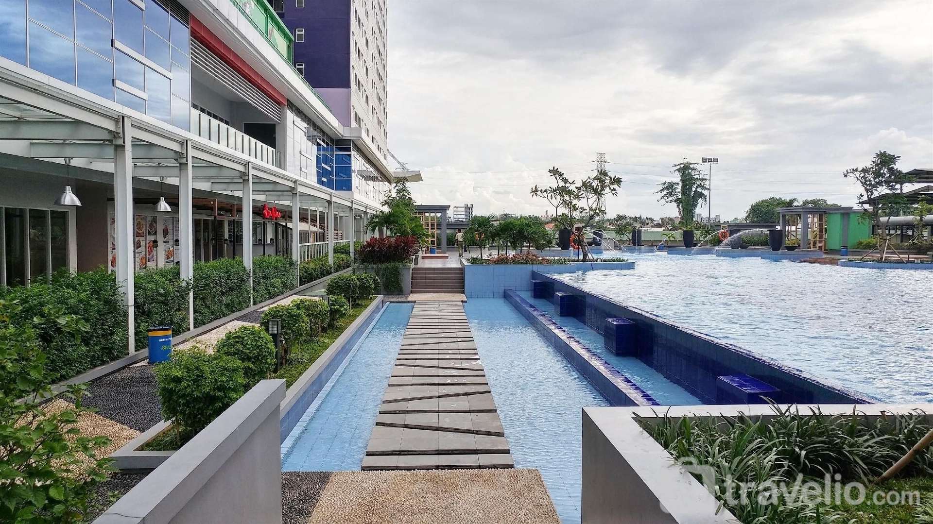 Relax 2BR Green Pramuka City Apartment By Travelio3
