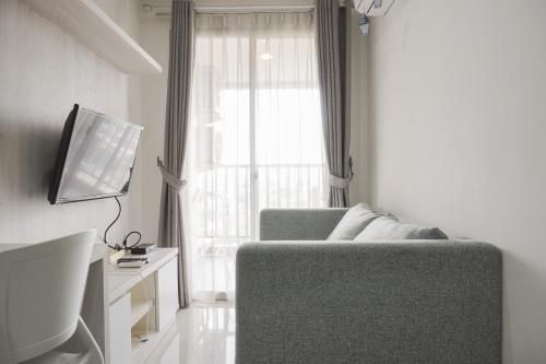 Homey 1BR at Belmont Residence Puri By Travelio1
