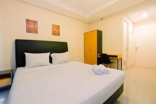 มินิมอลลิสต์ สตูดิโอ เกบาโยรัน ไอคอน อพาร์ต บาย ทราเวลลิโอ (Minimalist Studio Kebayoran Icon Apt By Travelio)2
