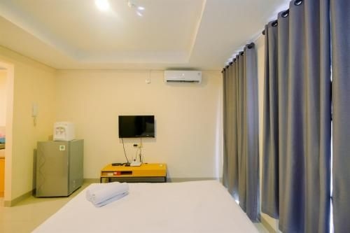 มินิมอลลิสต์ สตูดิโอ เกบาโยรัน ไอคอน อพาร์ต บาย ทราเวลลิโอ (Minimalist Studio Kebayoran Icon Apt By Travelio)1