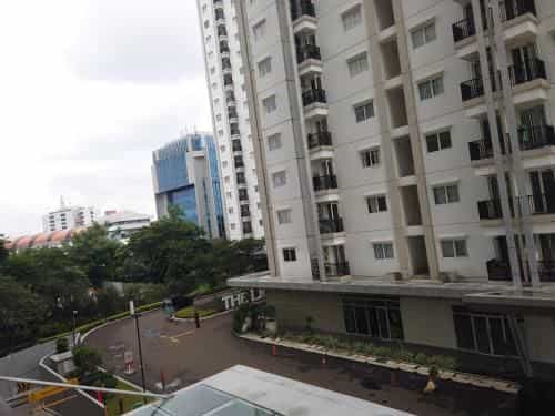 Cozy Tidy 2BR at Signature Park Grande By Travelio