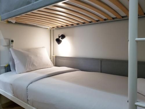 มินิมัลลิสต์ โคซี่ 2 เบดรูม แอท ลา ฮับ ซิตี้ อพาร์ตเมนต์ บาย ทราเวลลิโอ (Minimalist Cozy 2BR at La Hub City Apt By Travelio)0
