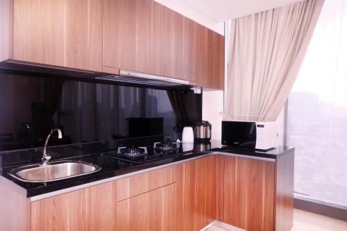 Pancoran BEST 2BR L'Avenue Apartment By Travelio4