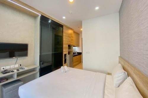 อีลีแกนท์ แอนด์ โฮมมี สตูดิโอ ซิปูตรา เวิลด์ 2 บาย ทราเวลลิโอ (Elegant & Homey Studio Ciputra World 2 By Travelio)1