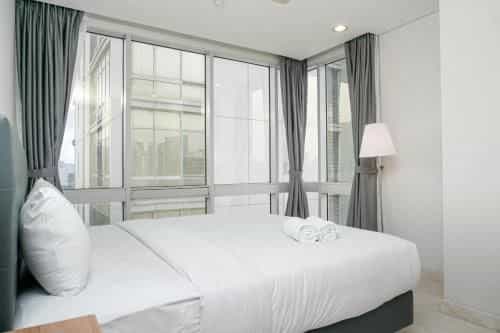 Comfortable 2BR The Empyreal Apartment By Travelio Comfortable 2BR The Empyreal Apartment By Travelio