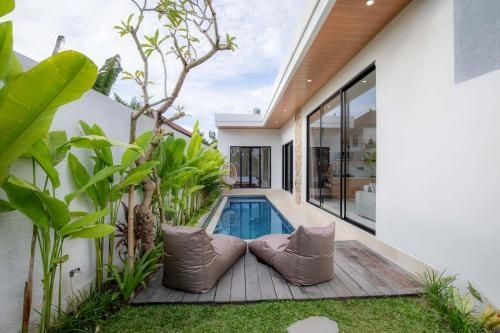 วิลล่ามอลอร์กา อูบุด 4 ห้องนอน พร้อมสระว่ายน้ำ (Villa Mallorca Ubud 4Bed w/ Pool)4