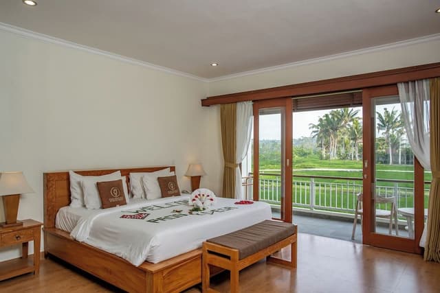 Deluxe Room Balcony with Rice Field View