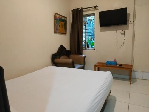Pemda 22 Mansion Mitra RedDoorz4
