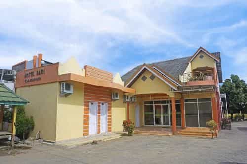 โอโย 91433 โฮเทลซารีเจเนปอนโต โอโย 91433 โฮเทลซารีเจเนปอนโต