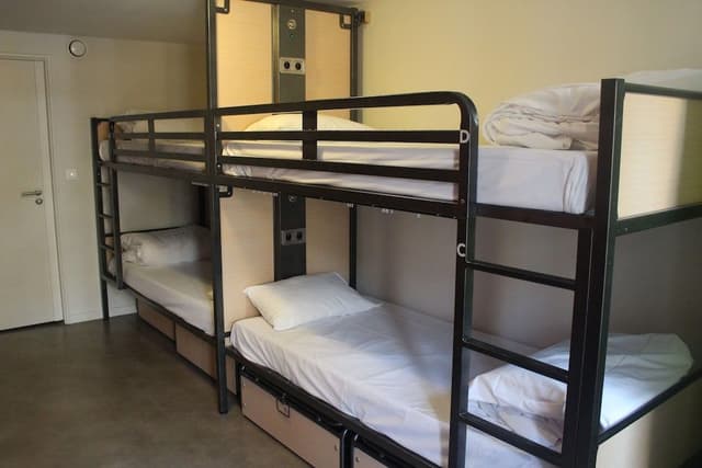 Bed in 4 beds dormitory with shared bathroom