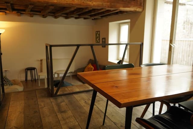 Room of 10 beds with shared bathroom