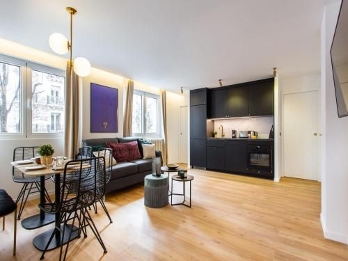 อพาร์ตเมนต์น่ารัก - 2 ห้องนอน / พักได้ 6 คน - คลองแซงต์มาร์แต็ง (Cosy apartment - 2BR/6P - Canal St Martin)3