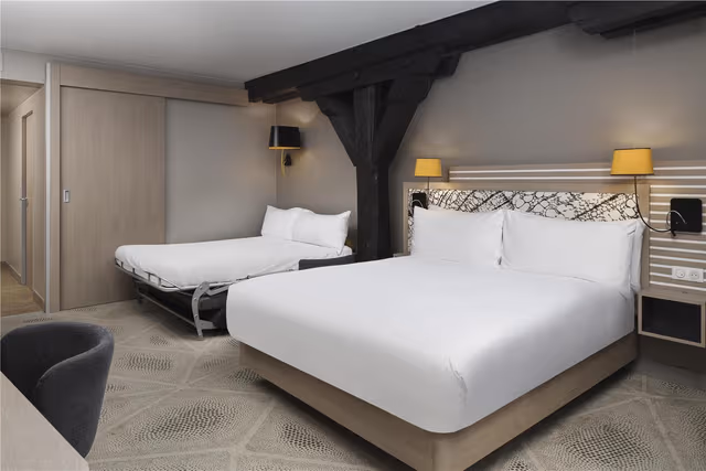 QUEEN DELUXE ROOM WITH SOFA BED