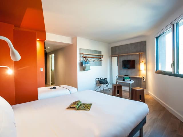 Room with A Large Bed and A Pull-Out Bed