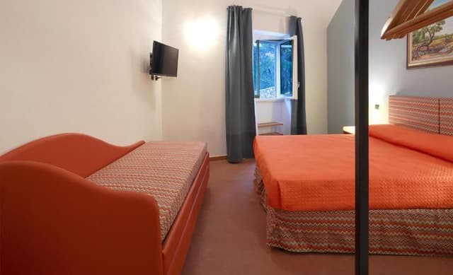 Quadruple Room with Private Bathroom