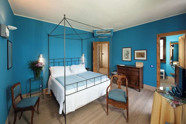 Junior Room, 1 Queen Bed, Balcony, Garden View