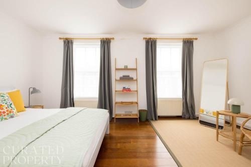 โรงแรมดูเพล็กซ์ดาดฟ้าแสนมีเสน่ห์ พริมโรสฮิลล์ (Charming Primrose Hill Rooftop Duplex)1