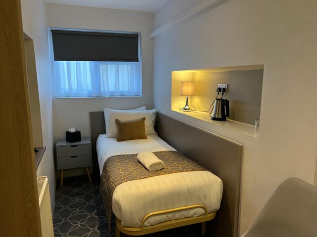 Basic Single Room with Shared Bathroom