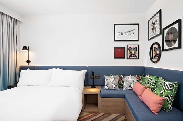 QUEEN ROOM WITH SOFA BED