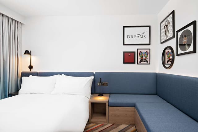 QUEEN ROOM WITH SOFA BED