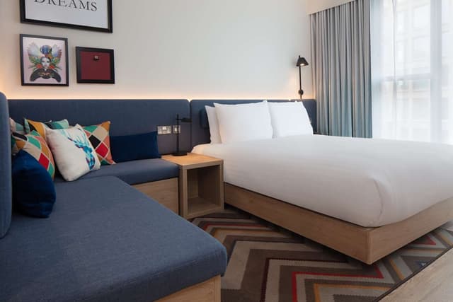 QUEEN ROOM WITH SOFA BED