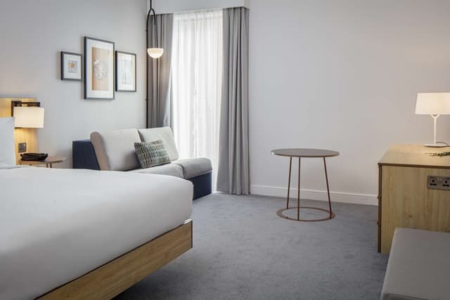 QUEEN ROOM WITH SOFA BED