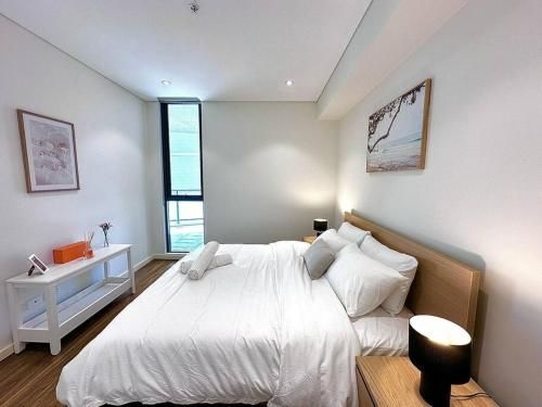 อพาร์ตเมนต์ 2 ห้องนอน 2 ห้องน้ำส่วนตัว ขนาด 85 ตร.ม. – ดรัมมอยน์ (Cosy 2-Bedroom Apartment, Homebush NSW 2140)1