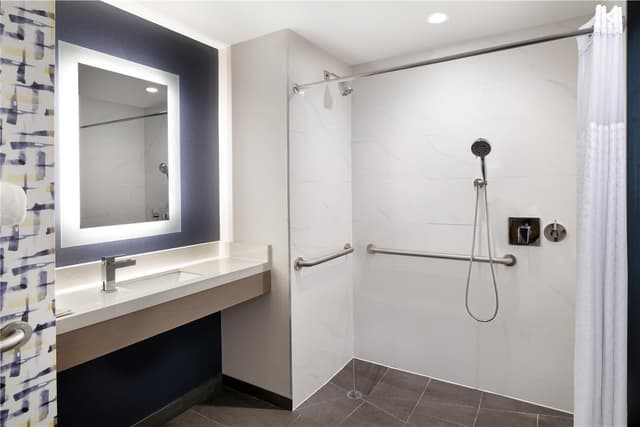 1 QUEEN MOBILITY ACCESSIBLE ROLL IN SHOWER