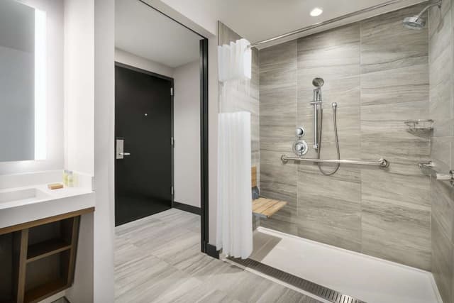 1 KING MOBILITY ACCESSIBLE ROLL IN SHOWER