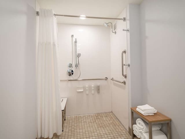 1 KING MOBILITY ACCESSIBLE W/ROLL IN SHOWER