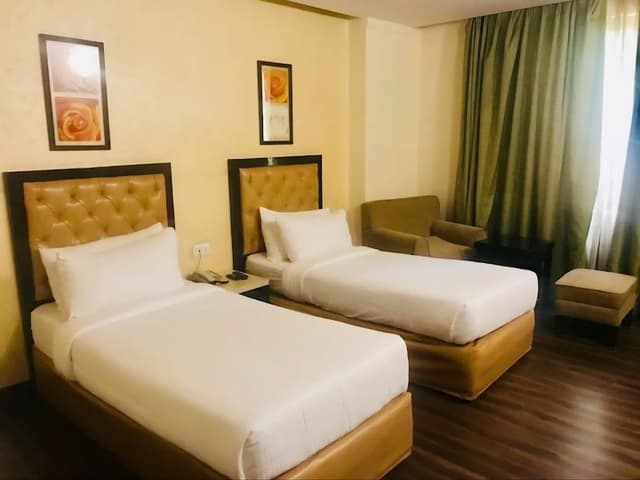 Deluxe Quadruple Room, City View