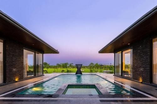 StayVista's Anantam - Villa with Massive Outdoor Pool with Deck & Sprawling Lawn1